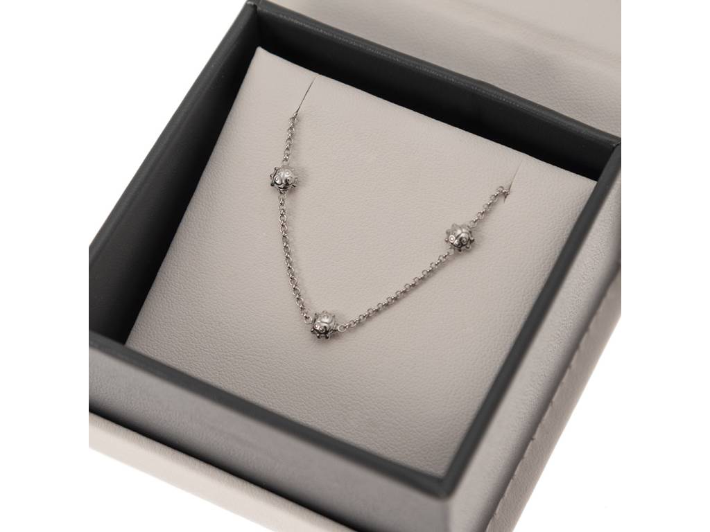 Chain baby bracelet with ladybug in 18kt white gold