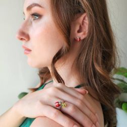 Photo of worn Ladybug Earrings with diamonds