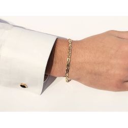 Photo of worn Bracelet 21,5cm x 4.4mm faceted 1+1 Tiger chain yellow gold