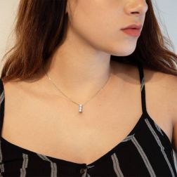 Photo of worn Trilogy Necklace 0.98ct with 3 GIA Certificate diamonds