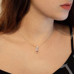 Photo of worn Trilogy Necklace 0.98ct with 3 GIA Certificate diamonds