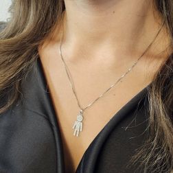 Ciondolo bimbo grande con zirconi foto indossata