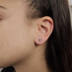 Photo of worn Solitary Studs earrings with round 3,75mm acquamarines in white gold