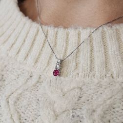 Photo of worn Trilogy scalar necklace with Red Ruby