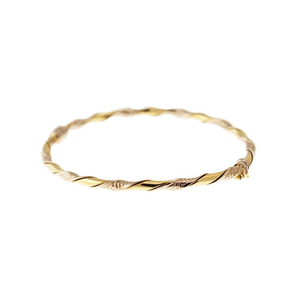 Bracciale con stampa Greca a spirale in Oro Giallo e Bianco