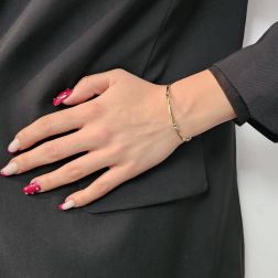 Bracciale con stampa Greca a spirale in Oro Giallo e Bianco foto indossata