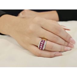 Photo of worn Banded design ring with 14 Pink Sapphires and 50 Diamonds