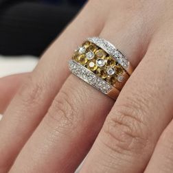 Photo of worn Banded Design Ring with 14 Yellow Sapphires and 58 Diamonds