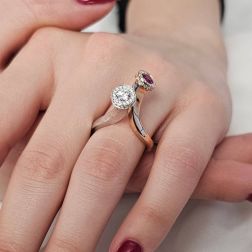 Photo of worn Diamond and Ruby Steli Ring in Rose and White Gold