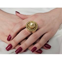 Photo of worn Ring with Gold pearl drop and Yellow Diamonds in a circle