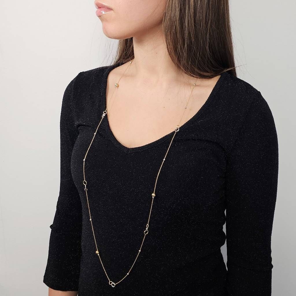 Photo of worn 103 cm long necklace with beads and spheres