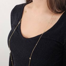 Photo of worn 103 cm long necklace with beads and spheres