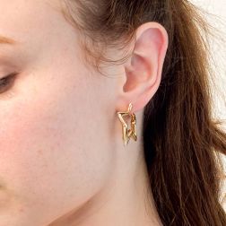 Photo of worn Yellow Gold Star Hoops Earrings
