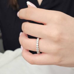 Photo of worn Platinum and 24 Diamond Veretta Eternity Ring