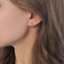 Photo of worn 3 Rhombus Pendant Earrings in White Gold