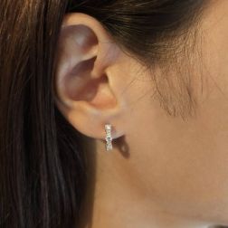 Photo of worn Round Hoops Rose Gold 30 Diamonds