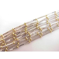 Collana fili oro bianco con dettagli in oro giallo