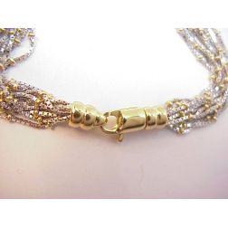 Collana fili oro bianco con dettagli in oro giallo