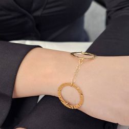 Photo of worn Hammered Circles and Shiny Chain Bracelet in Yellow Gold