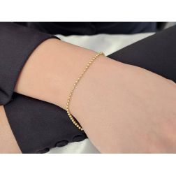 Bracciale Palline Oro Giallo 2mm chiusura occhiello a molla foto indossata