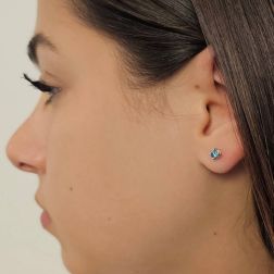 Photo of worn Classic Point of Light Earrings with Blue Diamonds 0,40ct