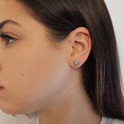 Photo of worn Flower Earrings with Blue Diamonds