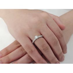 Photo of worn Solitaire "Bridge" 0.53ct GIA Diamond Platinum Signature Edge