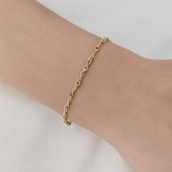 Bracciale corda Infinito alternato in Oro Giallo foto indossata