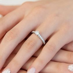 Photo of worn Solitaire "Bridge" 0.38ct GIA Diamond Platinum Signature Edge