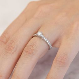 Photo of worn Solitaire "Bridge" 0.38ct GIA Diamond Platinum Signature Edge