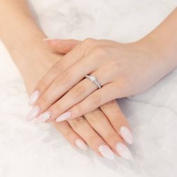 Photo of worn Solitaire "Bridge" 0.53ct GIA Diamond Platinum Signature Edge