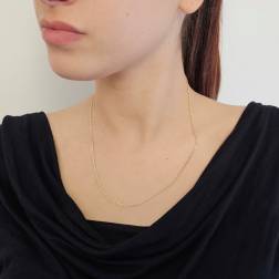 Photo of worn 50cm "Traversino" Chain Necklace 2.10mm x 0.60mm yellow gold