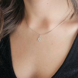 Photo of worn Initial Letter "R" Pendant with Diamonds in 18kt White Gold