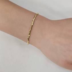 Photo of worn Bracelet/Anklet Octagonal faceted tubes in yellow gold.