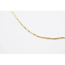 Bracelet/Anklet Octagonal faceted tubes in yellow gold.