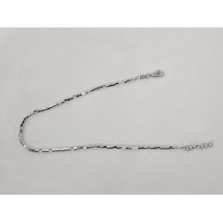 Bracelet/Anklet Octagonal faceted tubes in white gold.