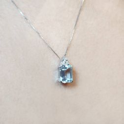 Photo of worn 9mm x 7mm Octagonal Aquamarine and 3 Diamonds Pendant