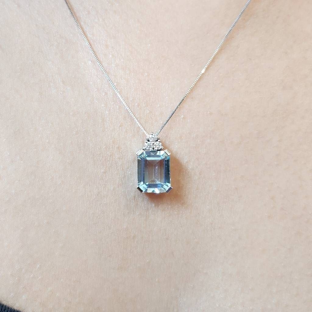 Photo of worn 10mm x 8mm Octagonal Aquamarine and 3 Diamonds Pendant