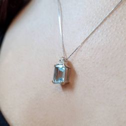 Photo of worn 10mm x 8mm Octagonal Aquamarine and 3 Diamonds Pendant