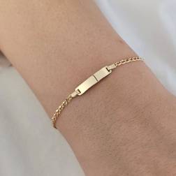 Photo of worn Baby 2mm flat oval chain bracelet with 3.90mm tag