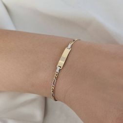 Photo of worn Bicolor Baby bracelet Figaro link with tag