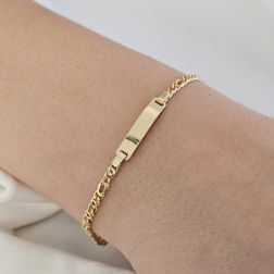 Photo of worn Baby 2.50mm partridge & tigre bracelet with 3.90mm tag