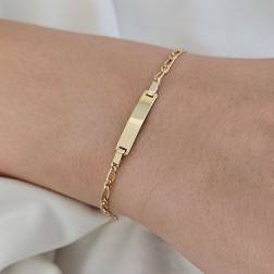 Photo of worn Baby Bracelet 2.10mm 1+1 Figaro chain with 3.90mm tag in Yellow Gold