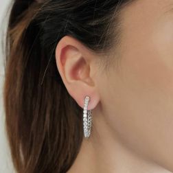 photo of worn of Hoop Earrings with a Half Round of Diamonds in Platinum