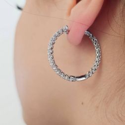 photo of worn of Hoop Earrings with a Half Round of Diamonds in Platinum