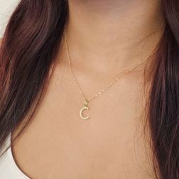 Photo of worn Initial Letter "C" Pendant with Zircon in Yellow Gold