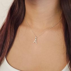 Photo of worn Initial Letter "A" Pendant with Zircon in White Gold