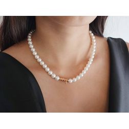 Photo of worn Akoya Pearls Necklace with Spiral Clasp and Mandarin Sapphires