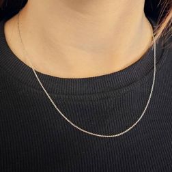 Photo of worn Platinum Oval Rolò chain necklace 45cm x 1.10mm