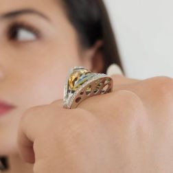 photo fo worn of Design Ring "Mid-Summer Dream" with yellow and blue Topaz and Diamonds in 18kt white gold